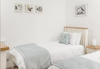 The kids will love the quirky artwork in the twin bedroom.