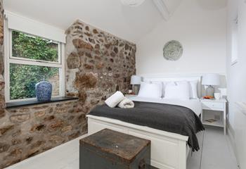 The cottage still has traditional features such as the lovely granite walls.