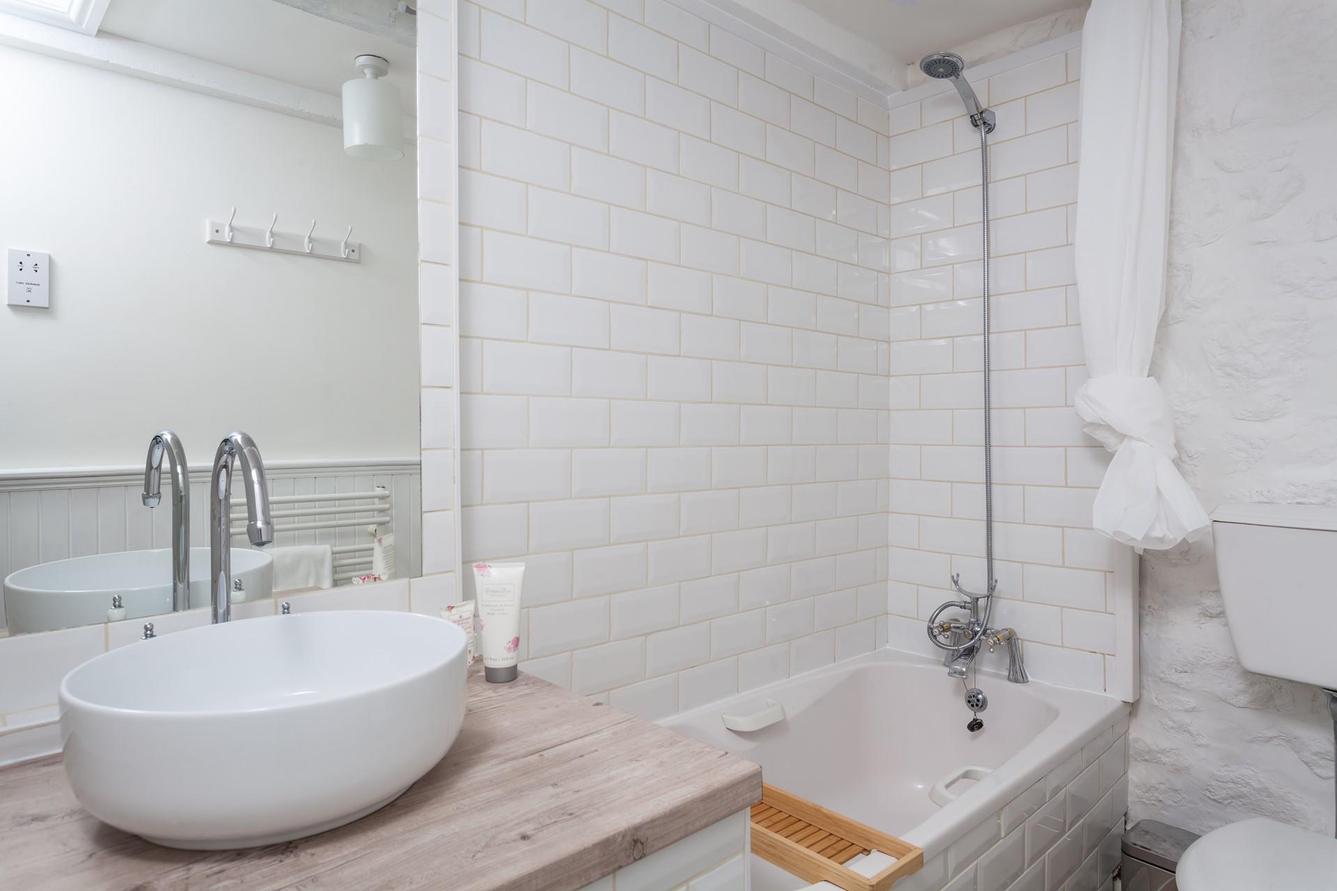 The modern and sleek bathroom is the ideal space to get ready each morning.