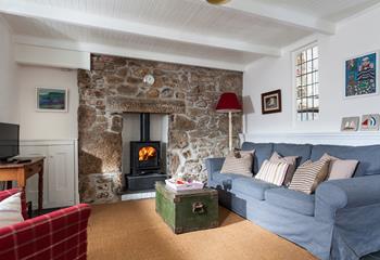 Listen to the crackle of the woodburner whilst you relax in the sitting room.