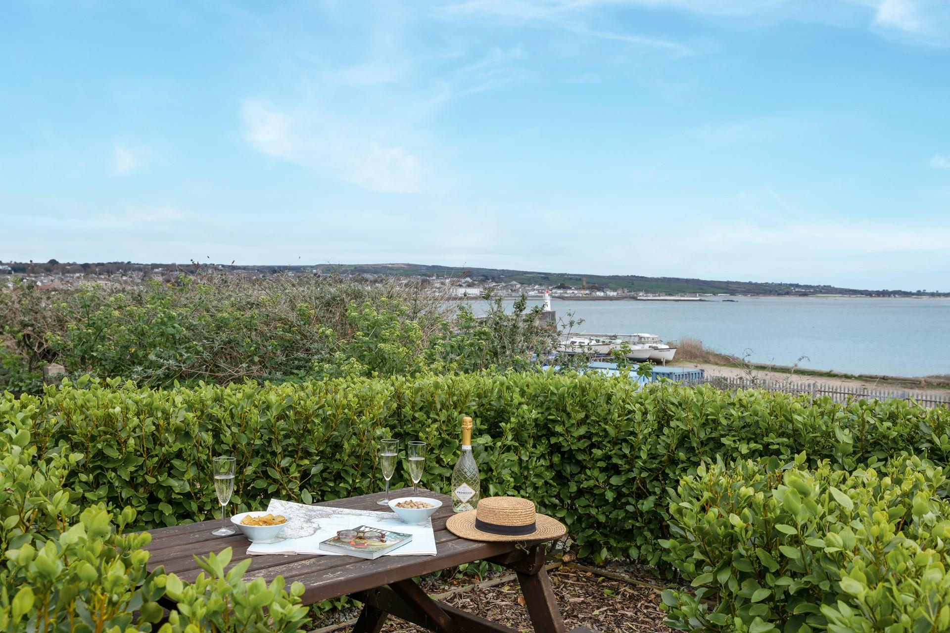 Enjoy a glass of something chilled whilst gazing out to sea.