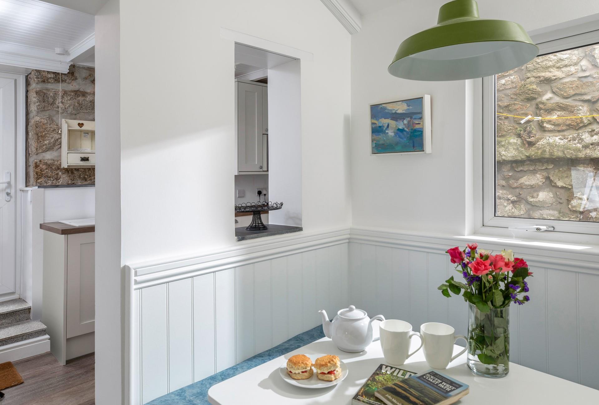 The quaint cottage has all you need for a relaxing stay.