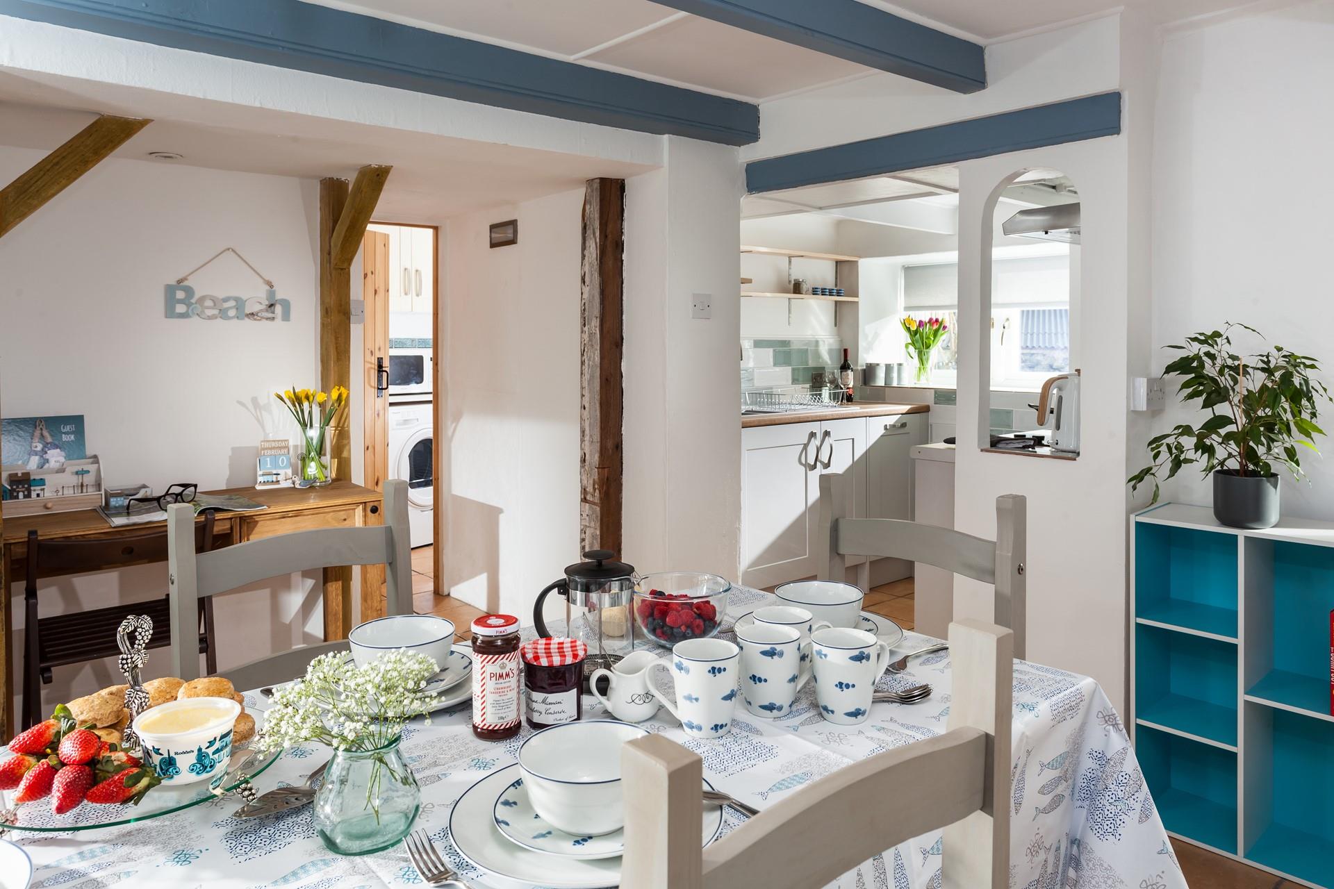 Indulge in a delicious Cornish Cream Tea in the open plan kitchen/dining area.