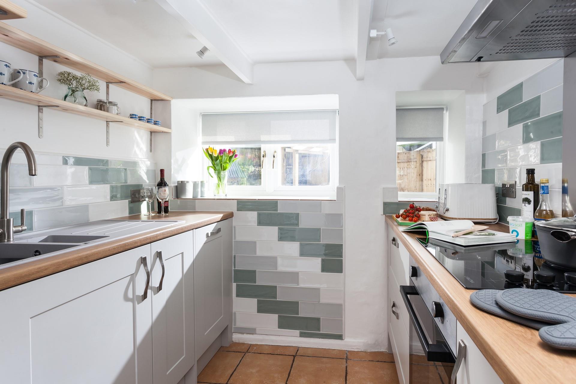 Rustle up some delicious dinners in this stylish galley kitchen. 