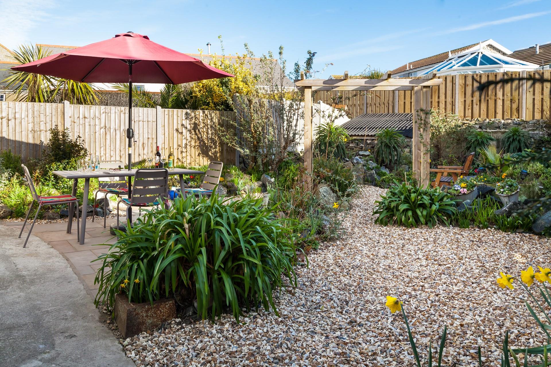 Watch the garden start to bloom in spring as the sun comes out.