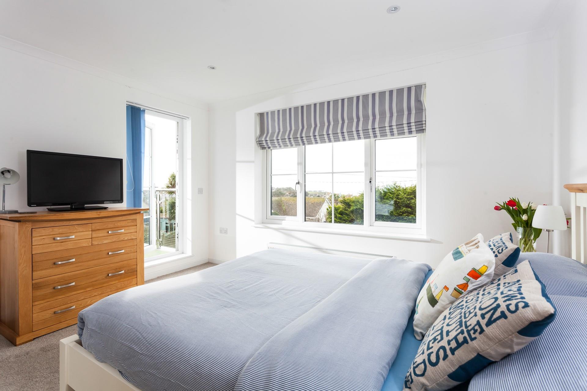 Gaze out at the sea across the beautiful village of Mullion. 