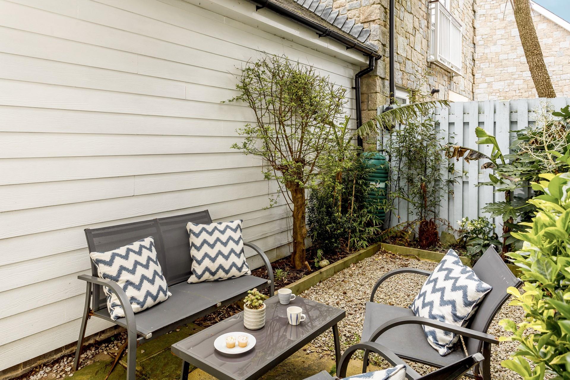 Treat yourself to a Cornish cream tea in the afternoon sunshine.