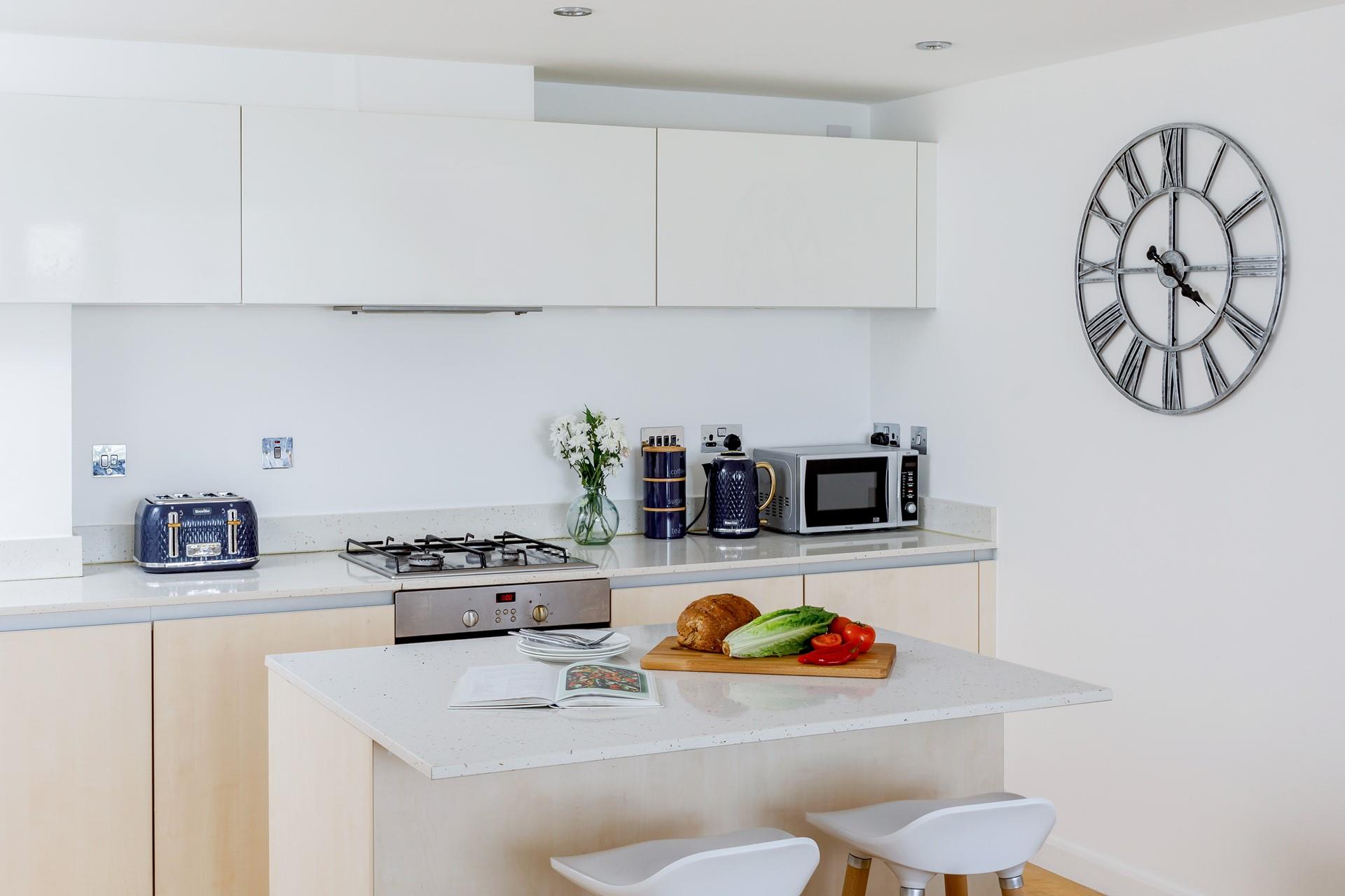 Sit at the breakfast bar and plan your days over a cup of morning coffee. 