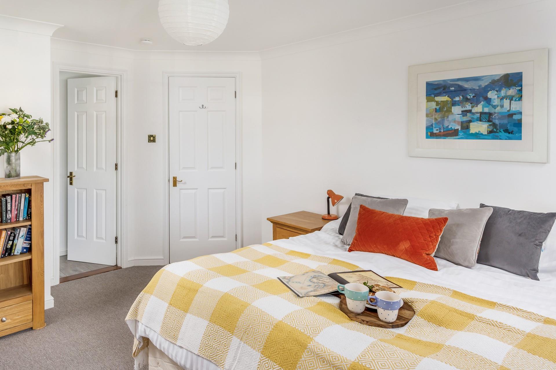 The master bedroom has an ensuite and super spacious king size bed.