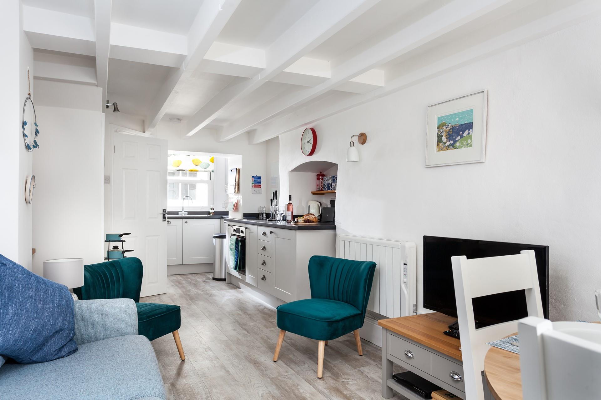 The open plan living space allows you to cook and dine whilst spending time together as a family.