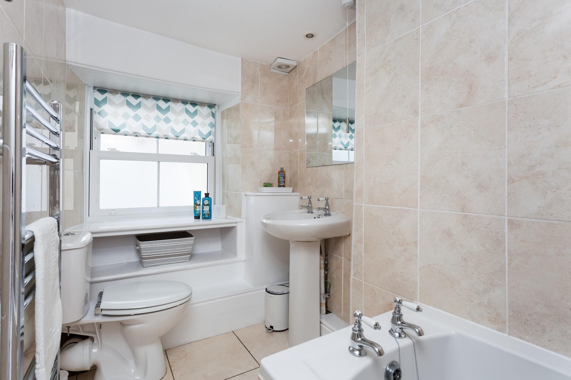 The family bathroom offers guests a place to get ready in the morning and for evenings out.