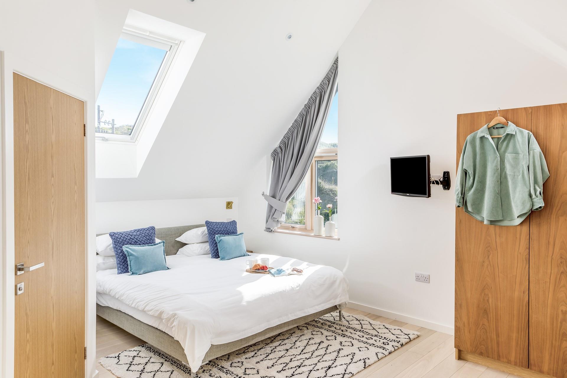 Wake up in the luxurious soft sheets and sip your first coffee of the day with the sun beaming through the windows.