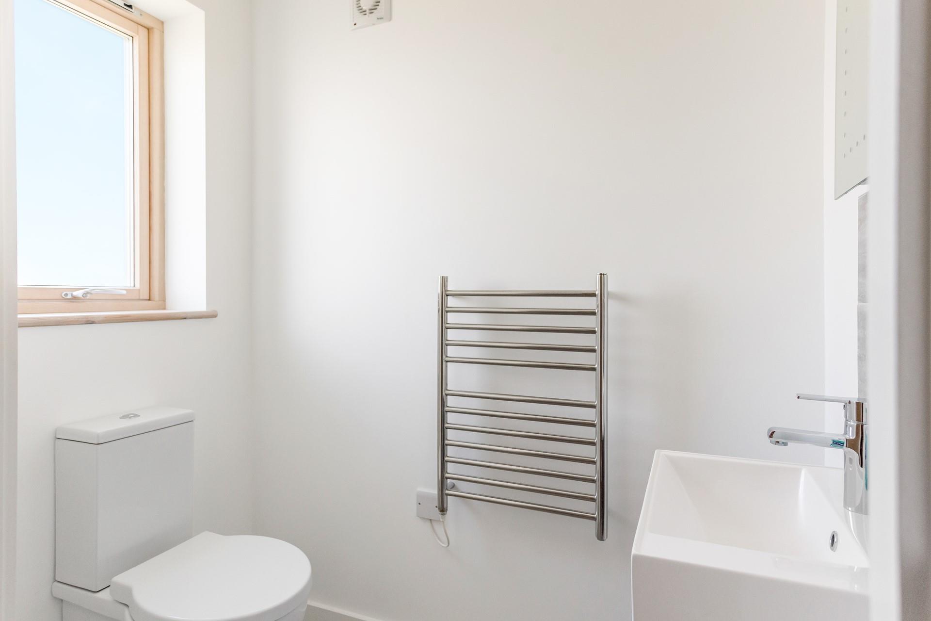 Enjoy warm fluffy towels straight from the heated towel rail.