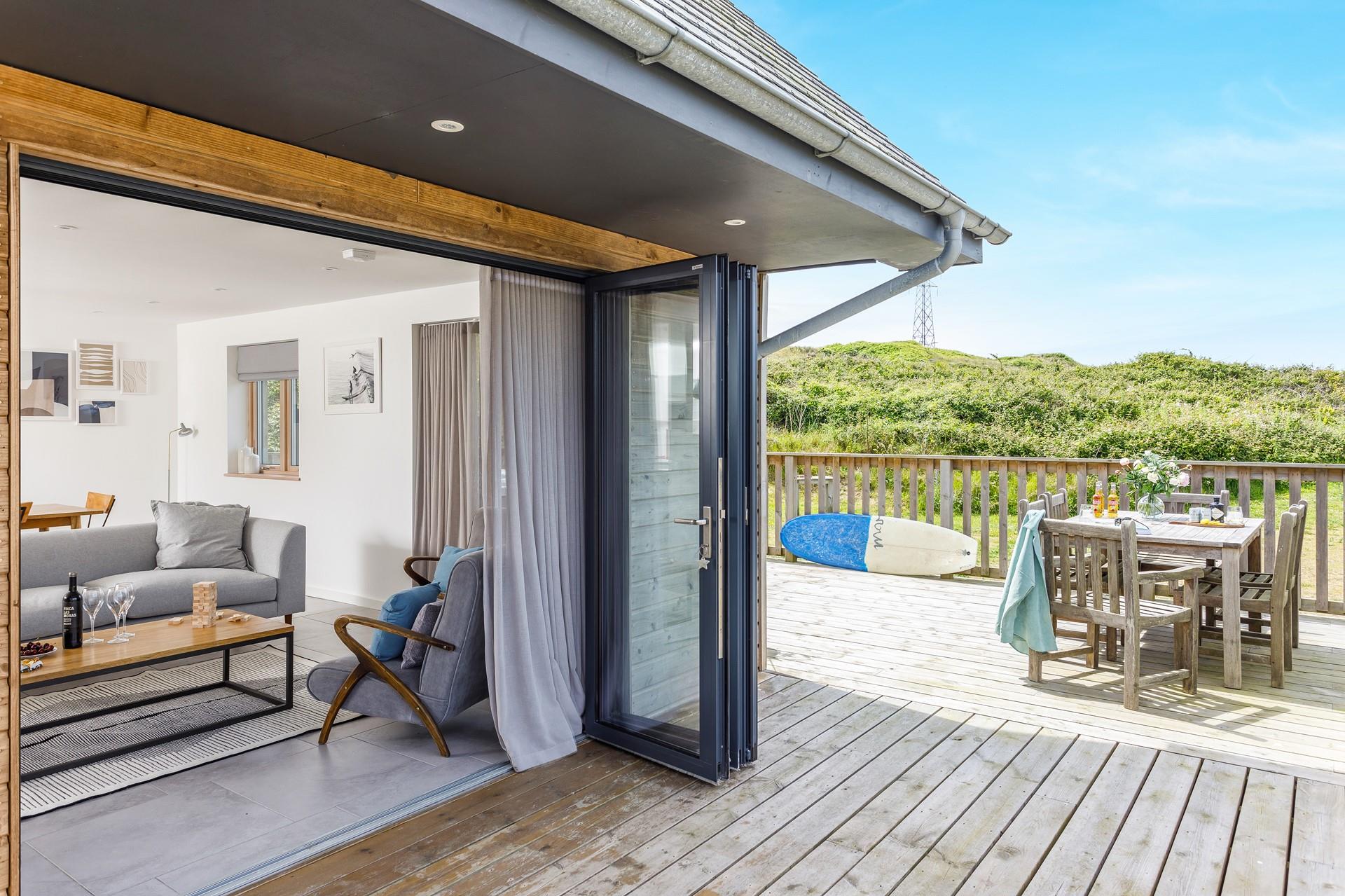 The large decking area is perfect for al fresco dining on sunny afternoons.