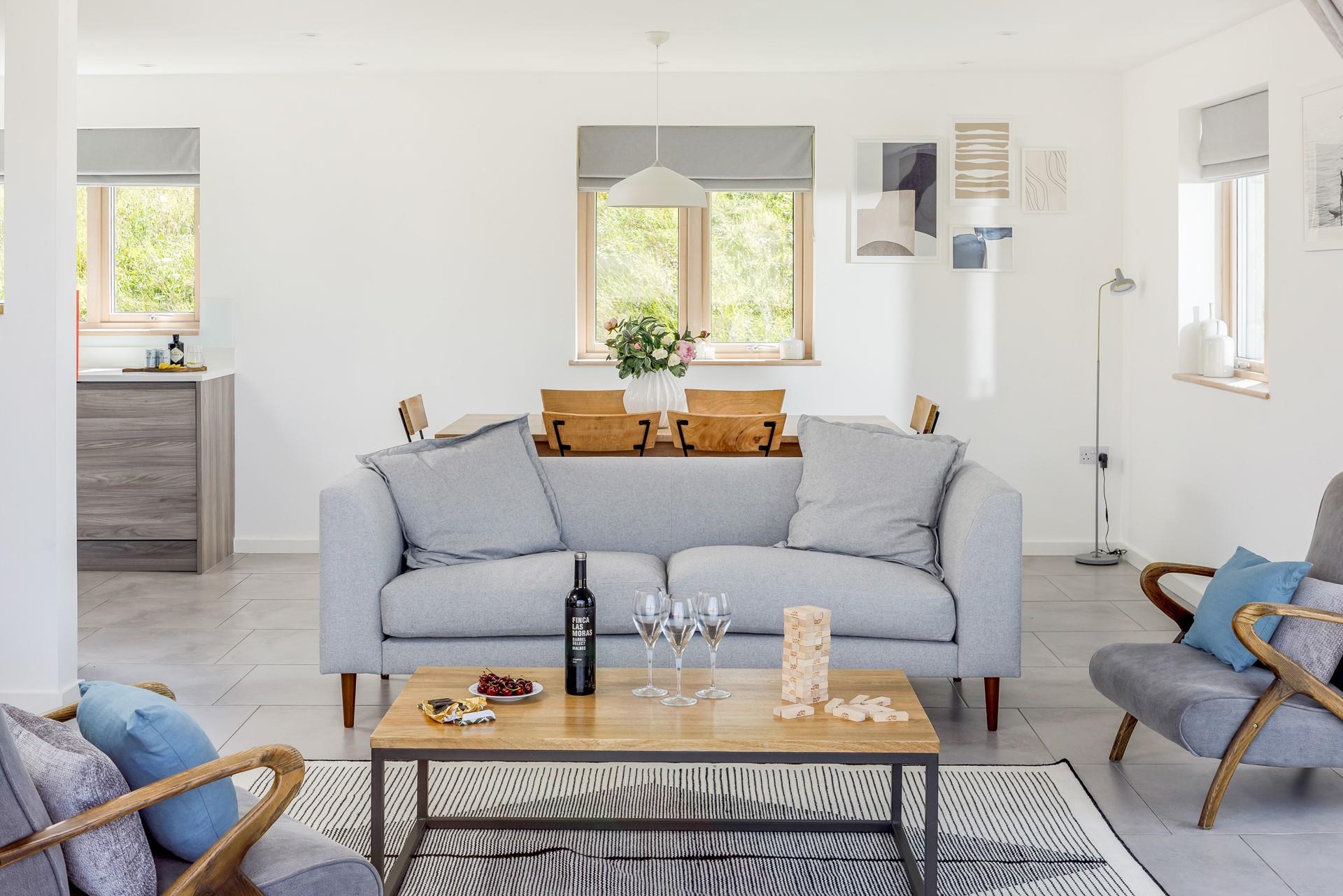 Sink into the sumptuous sofa and sip your favourite wine on a sunny evening.