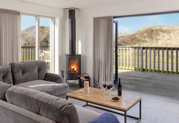 Relaxation is guaranteed at this luxurious beach house, complete with stylish furnishings and a cosy woodburner.