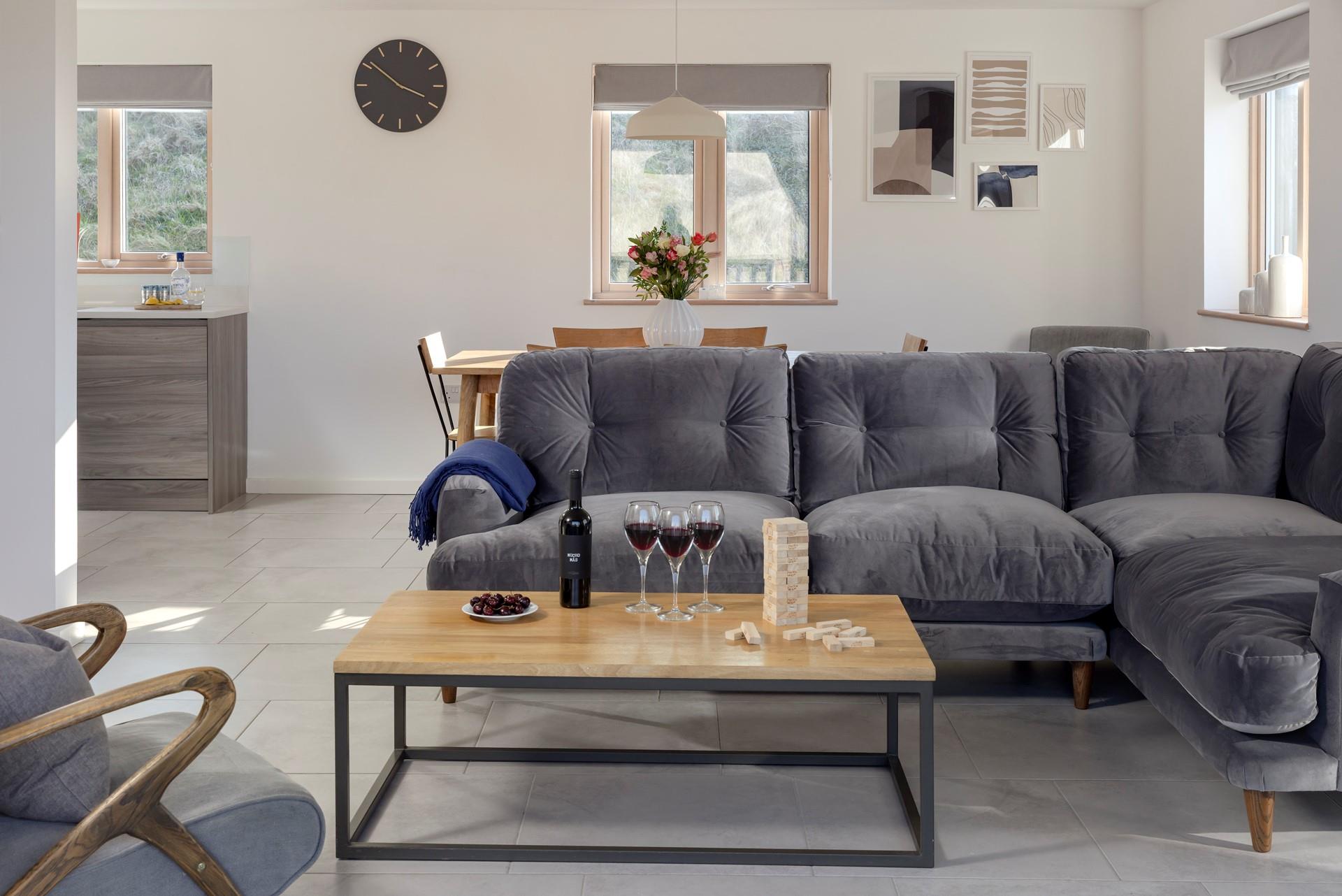 Sink into the sumptuous sofa and sip your favourite wine on a sunny evening.