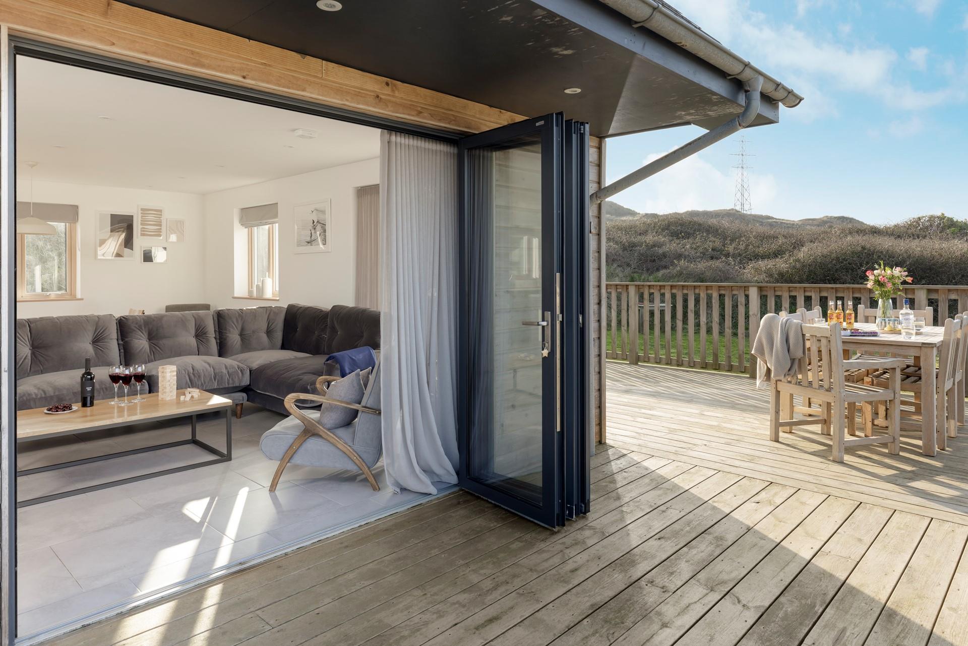 The large decking area is perfect for al fresco dining on sunny afternoons.