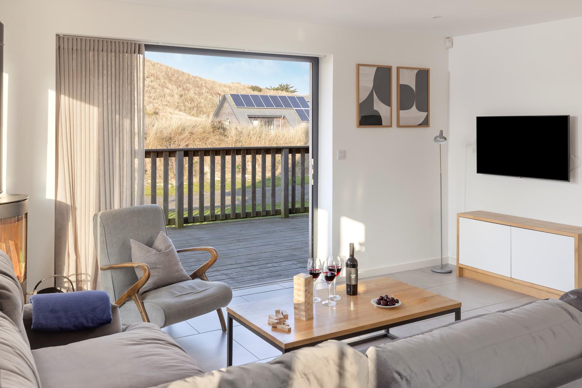 Open the bi-fold doors and let the fresh summer breeze run through the lodge.