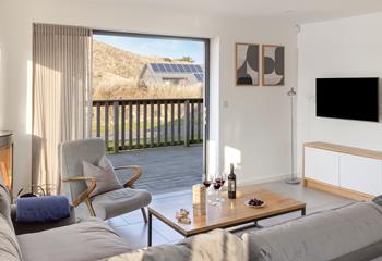 Open the bi-fold doors and let the fresh summer breeze run through the lodge.