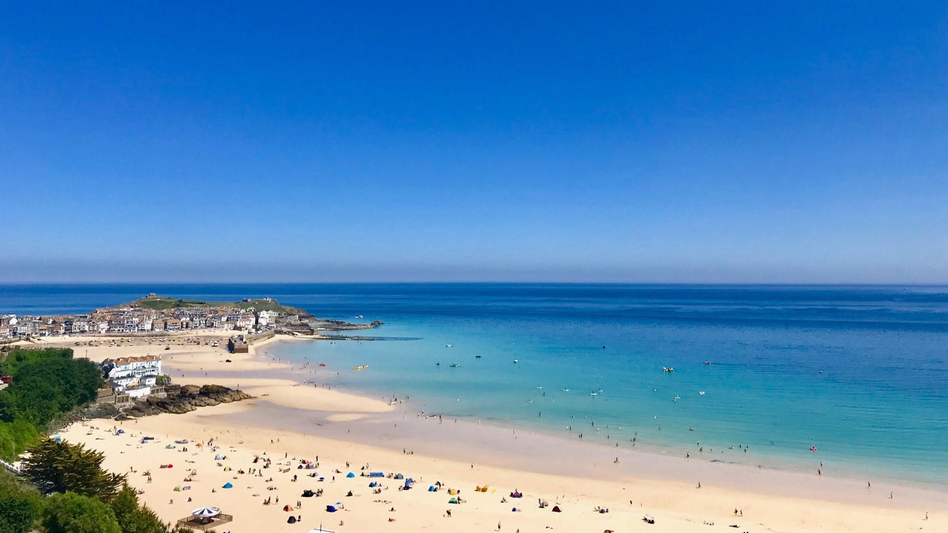 Spend your days relaxing on the white sands and turquoise waters of Porthminster beach.