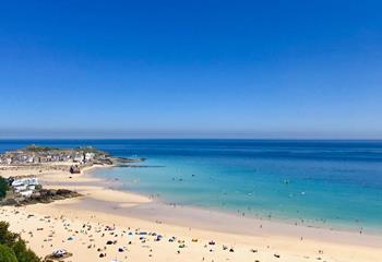 Spend your days relaxing on the white sands and turquoise waters of Porthminster beach.