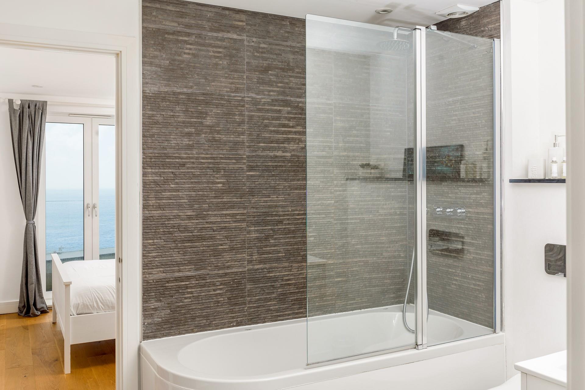 Wake up and wander into the modern bathroom to get ready for the day.