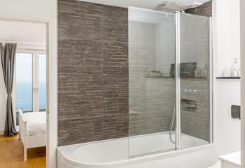 Wake up and wander into the modern bathroom to get ready for the day.