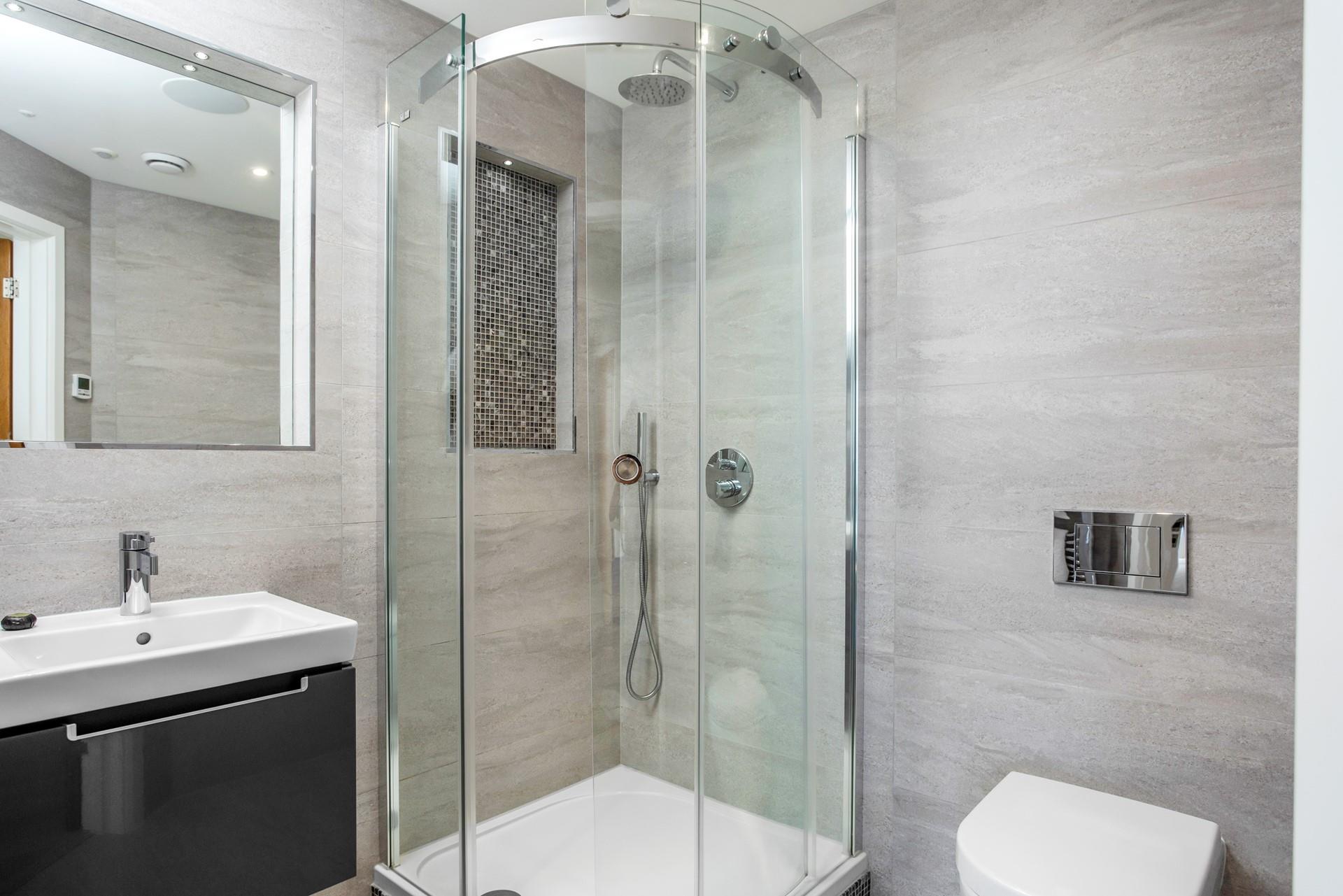 Step into the en-suite and start the day with a refreshing shower.