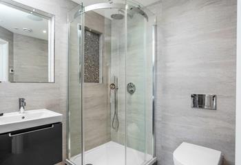 Step into the en-suite and start the day with a refreshing shower.