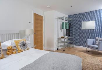 Perfect for adults or children, the second bedroom is cheerful and welcoming.