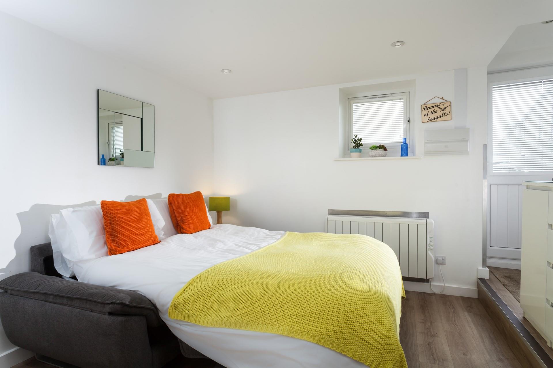 After a day filled with sunshine and coastal path walking come back to cosy into bed.