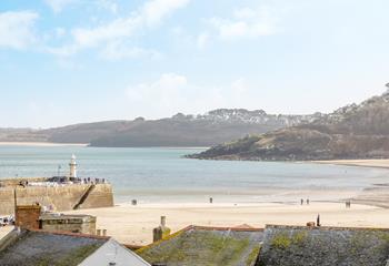 Enjoy sea views across the harbour from the double bedroom.