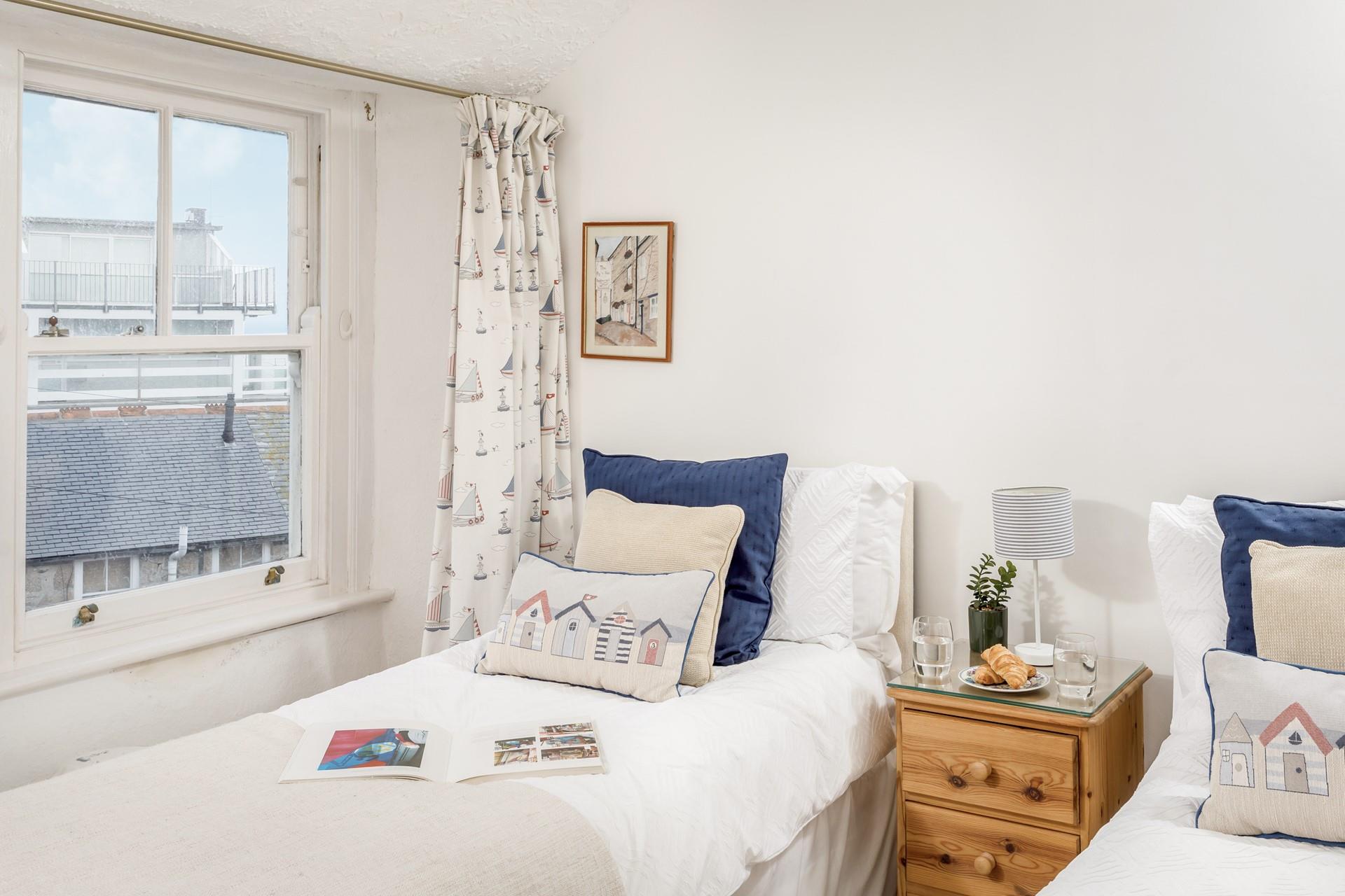 The twin beds are perfect for the kids, making this a great Cornish bolthole for a family breakaway.