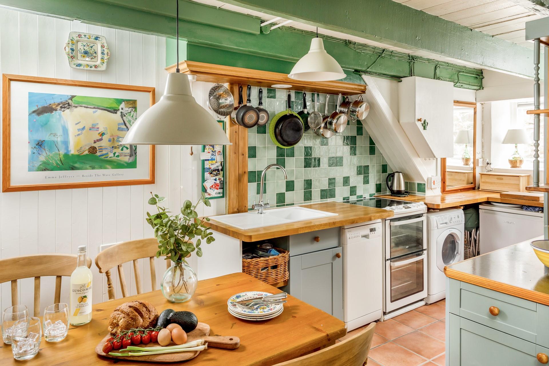 The rustic style kitchen is perfectly equipped to cook a tasty meal.