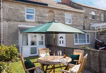 Dine al fresco in the garden on a sunny evening.