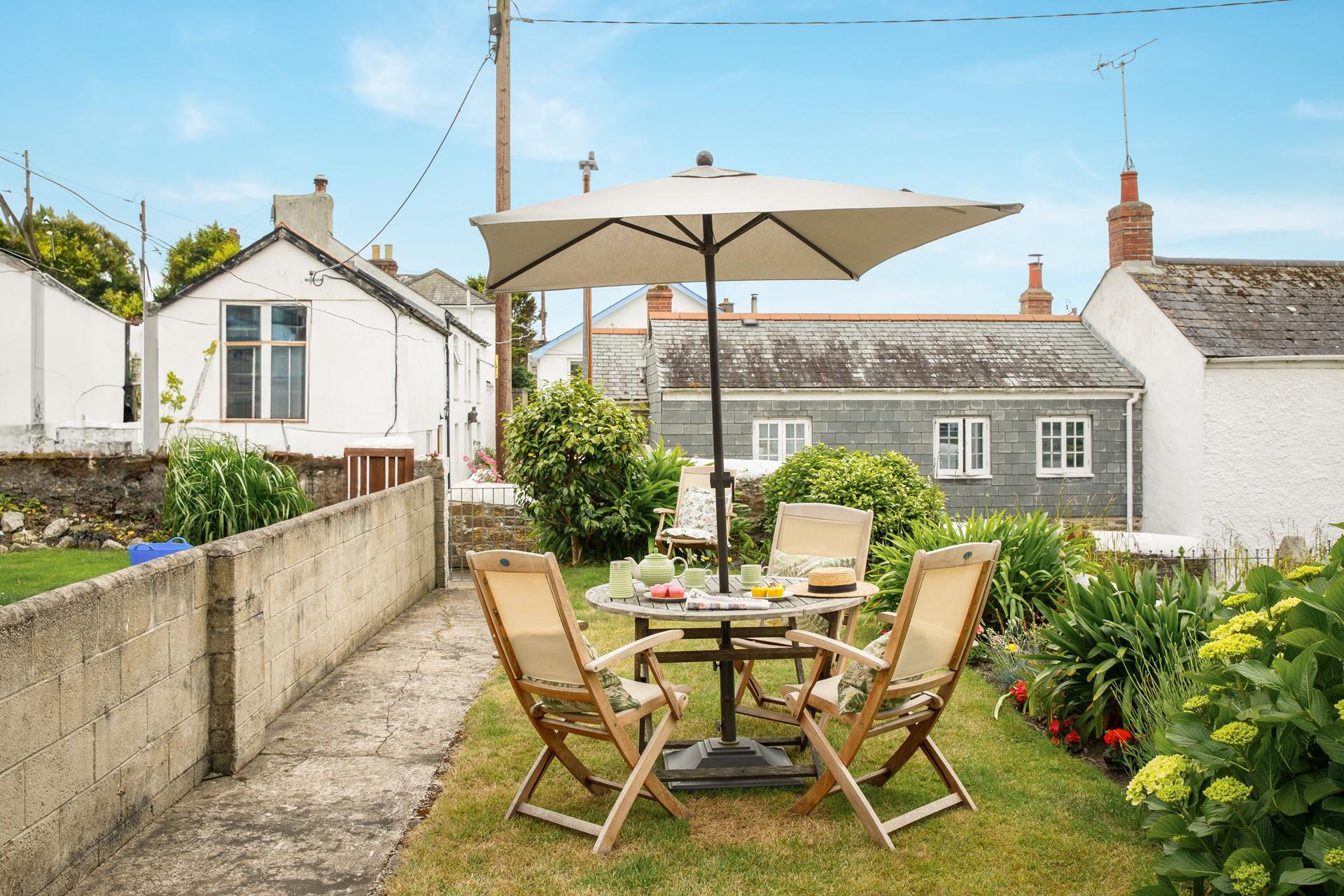 Enjoy tea and cake in the sunny garden.