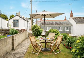 Enjoy tea and cake in the sunny garden.