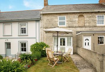 Dine al fresco in the garden on a sunny evening.
