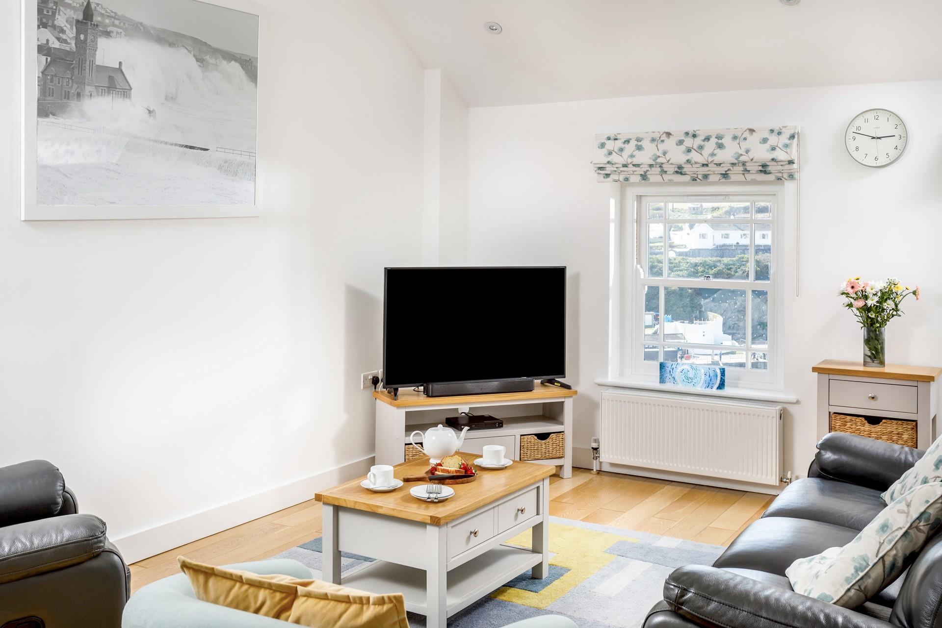 Views of the harbour can be enjoyed from the comfort of the sitting room.