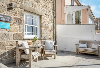 The lovely sun trap front patio is a great space to relax morning or evening.