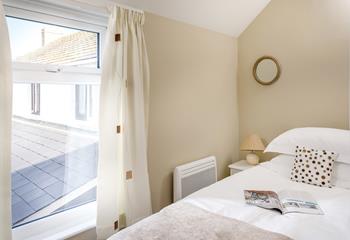Bedroom 2 has a cosy single bed offering a peaceful night's sleep.