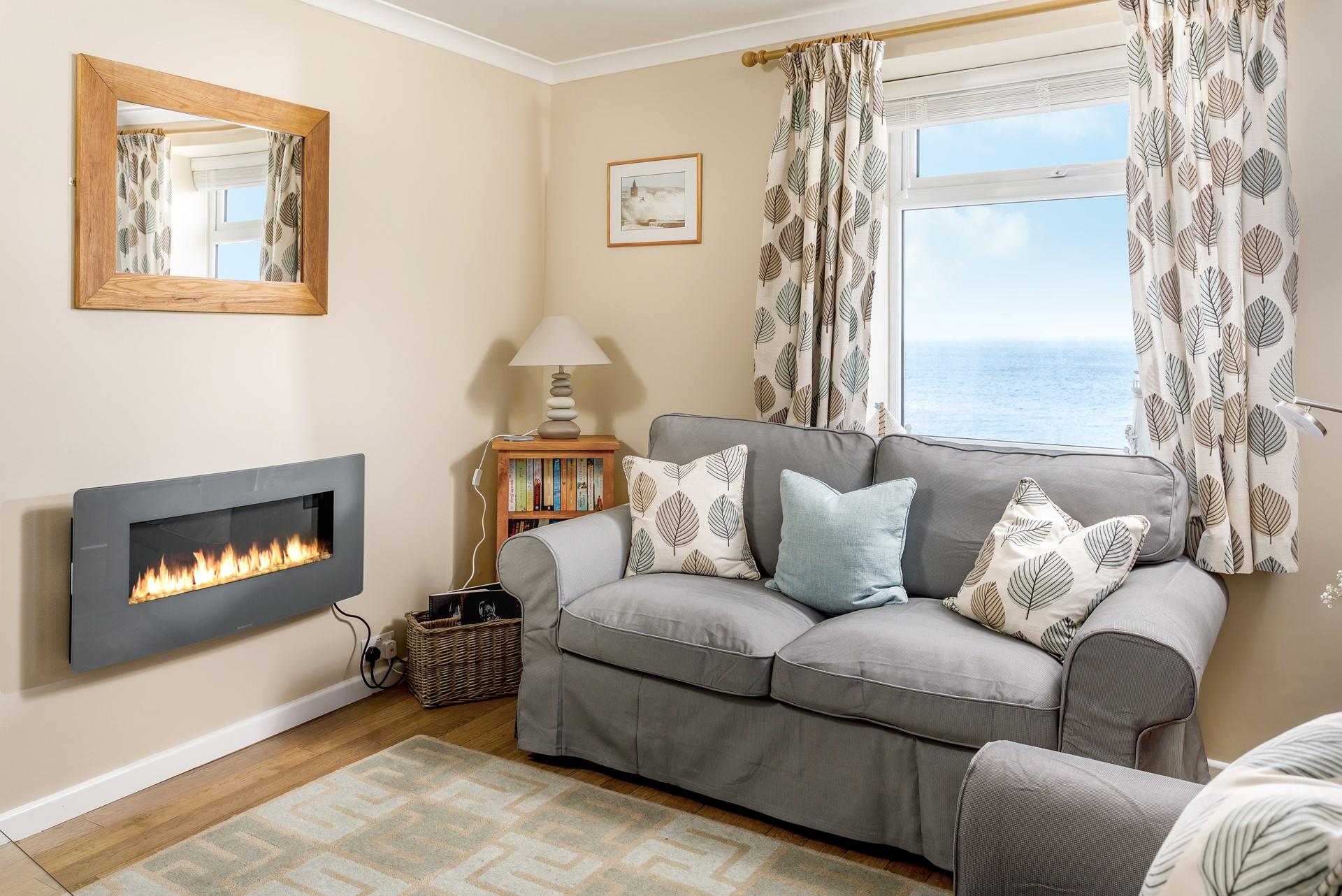 Snuggle up with the flame effect fire on a cosy evening.