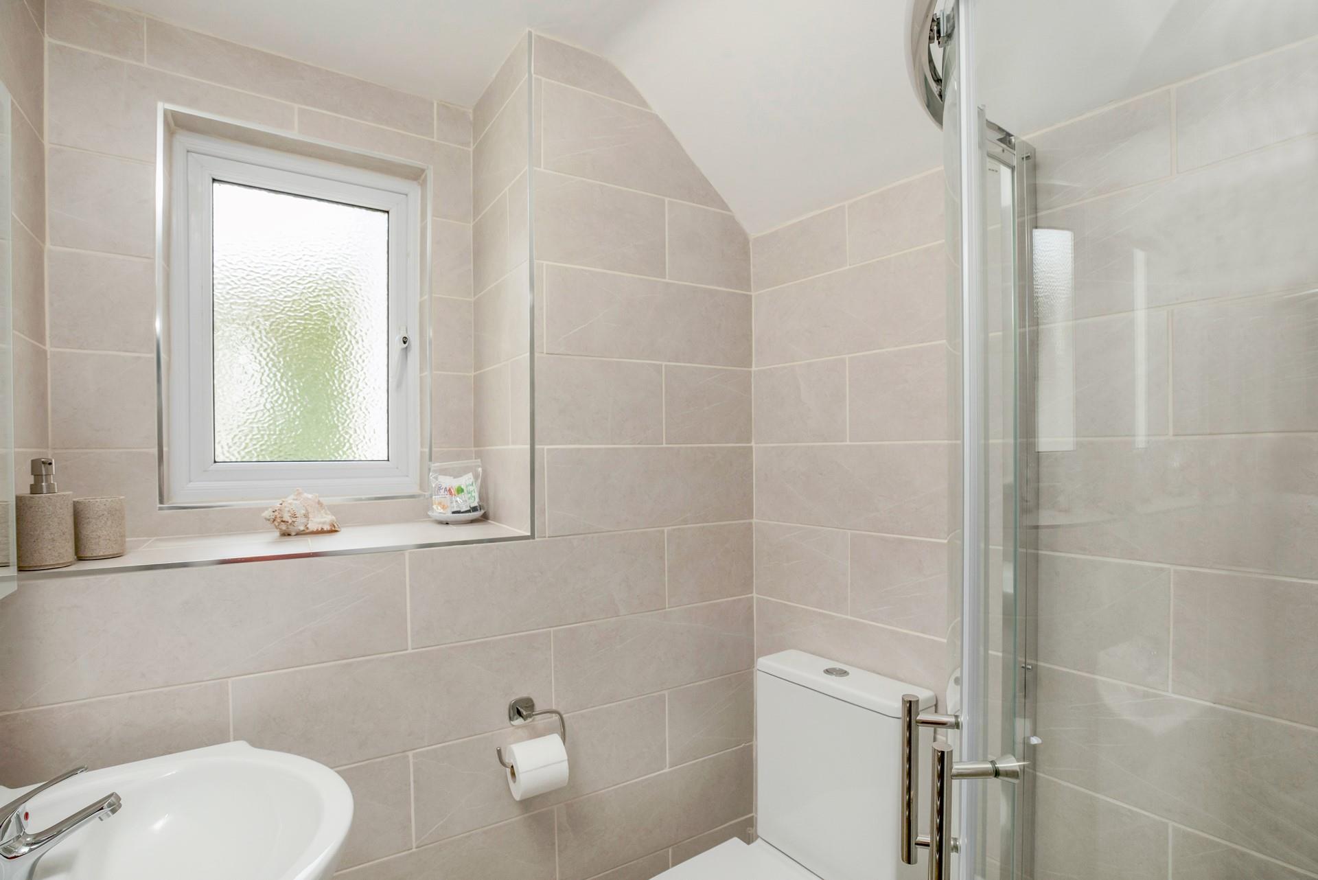 Get ready for the day in the well-equipped shower room. 