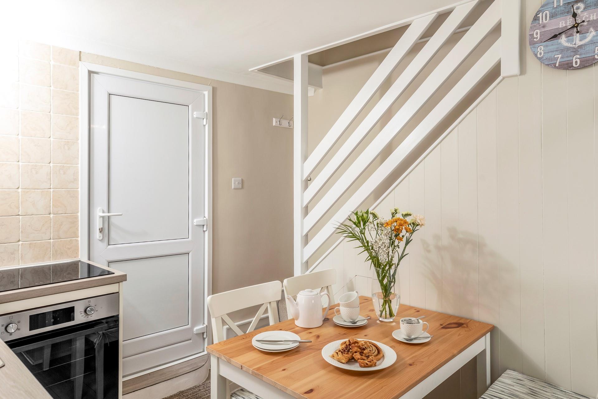 Tuck into a delicious dinner around the dining table.