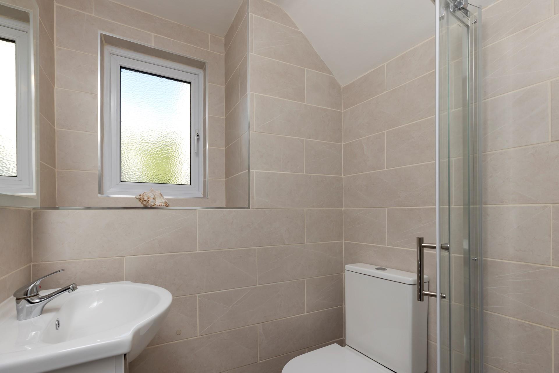 Get ready for the day in the modern shower room. 