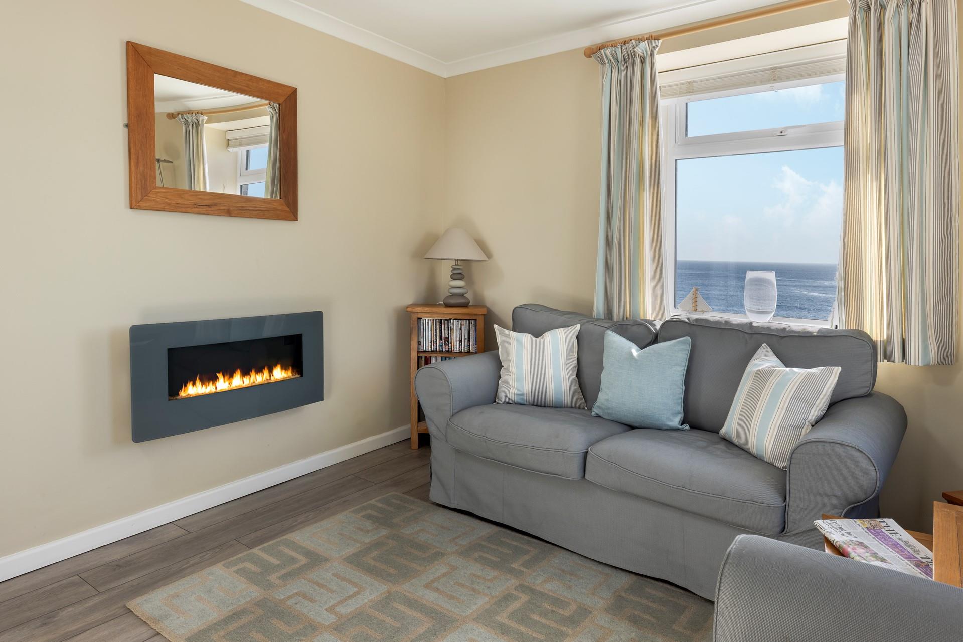 Snuggle up with the flame effect fire on a cosy evening.