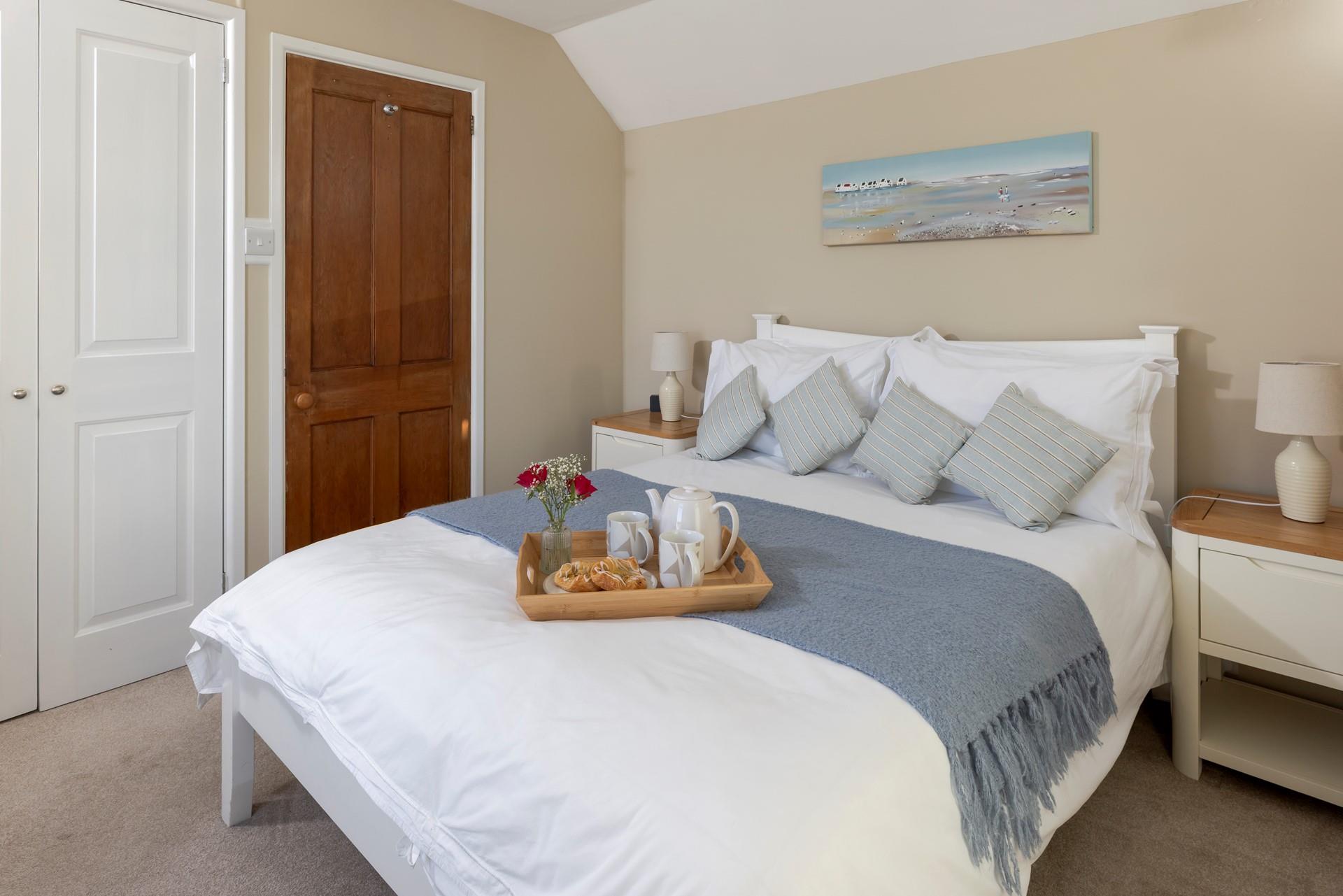 Coastal blues are a nod to the seaside location.