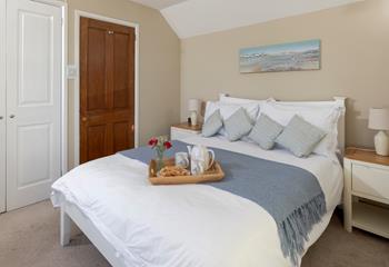 Coastal blues are a nod to the seaside location.