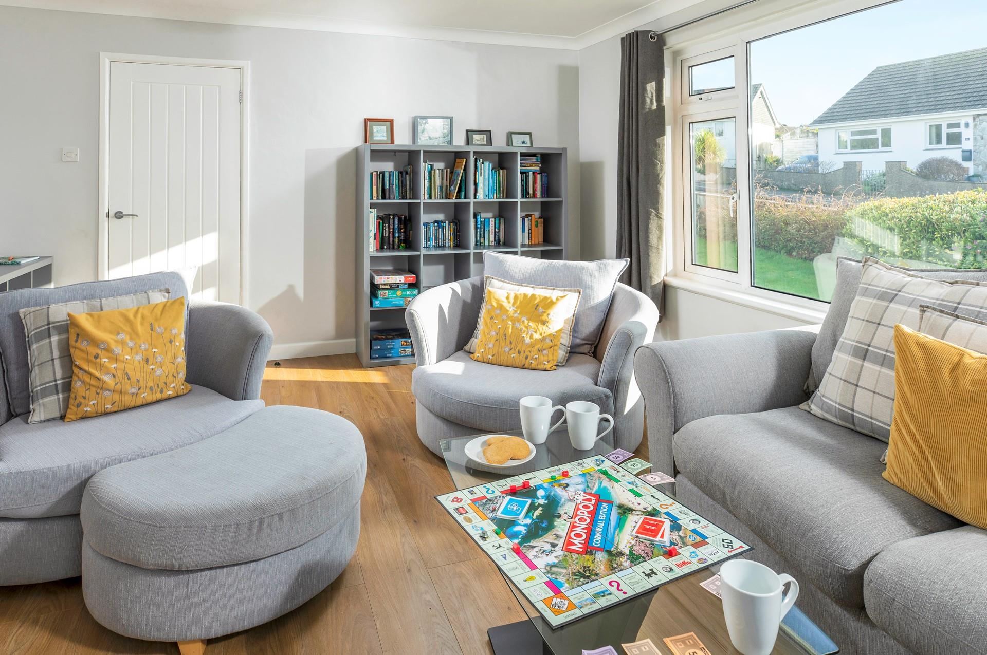 Sink into the comfortable sofas and relax with the flame effect fire flickering.